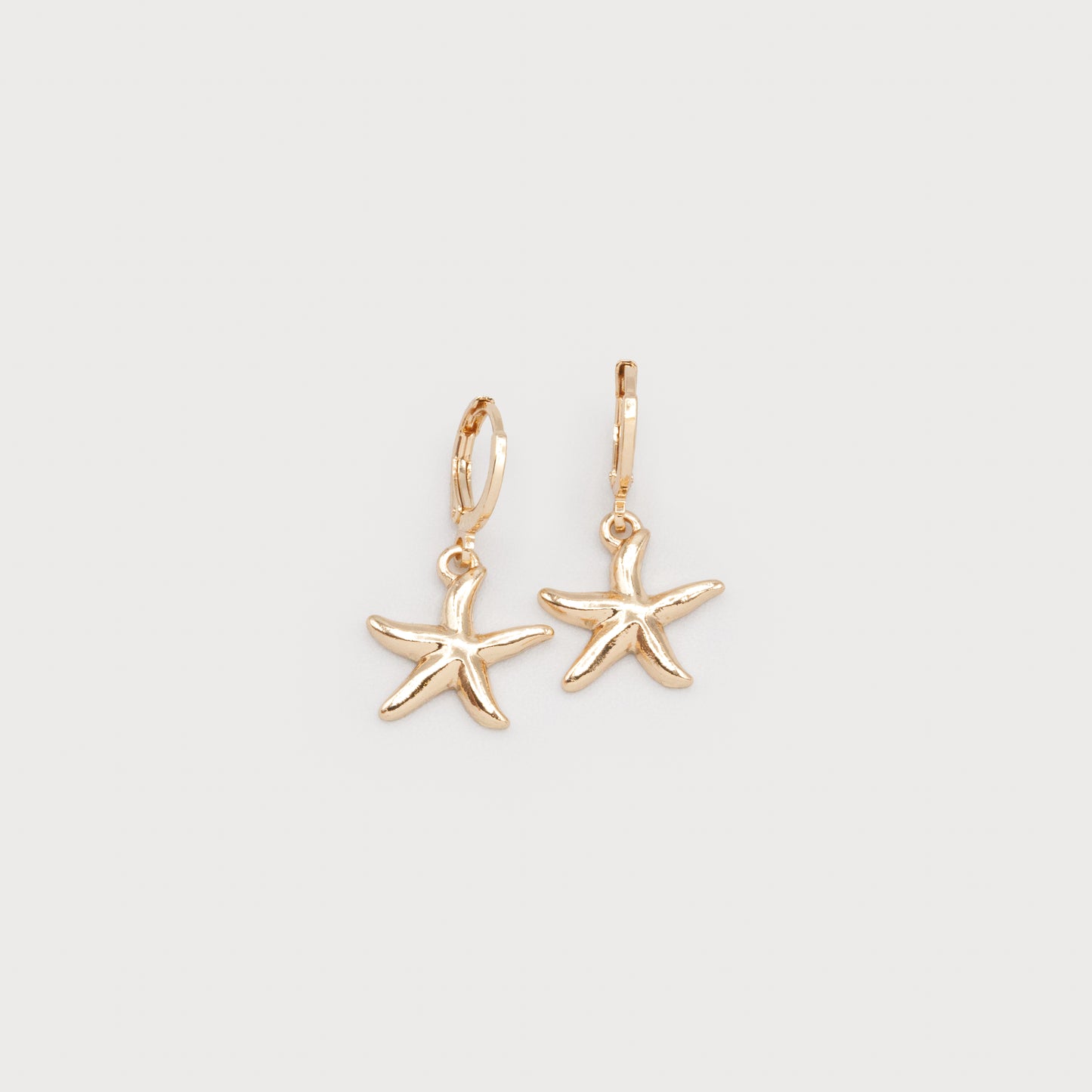 Boucles d'oreilles avec petit pendentif étoile de mer