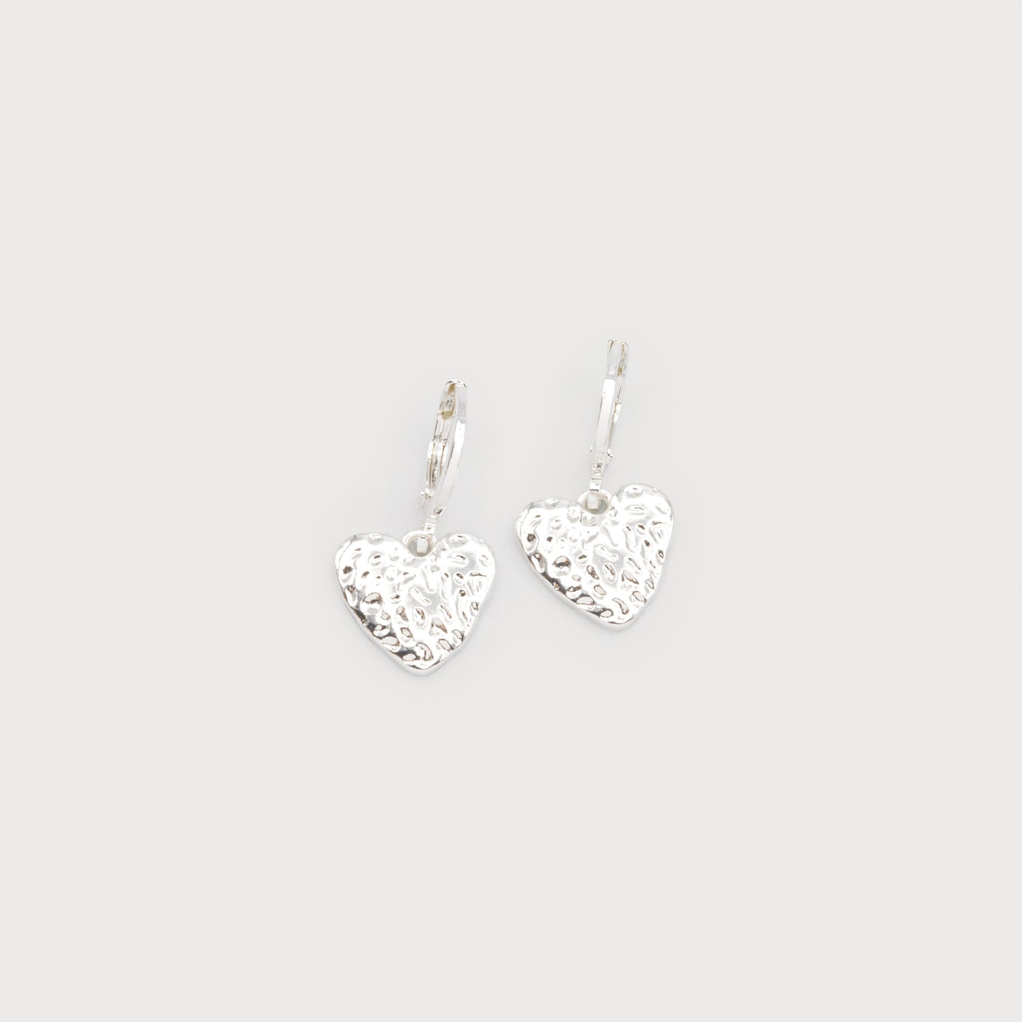 Boucles d'oreilles avec petit pendentif cœur