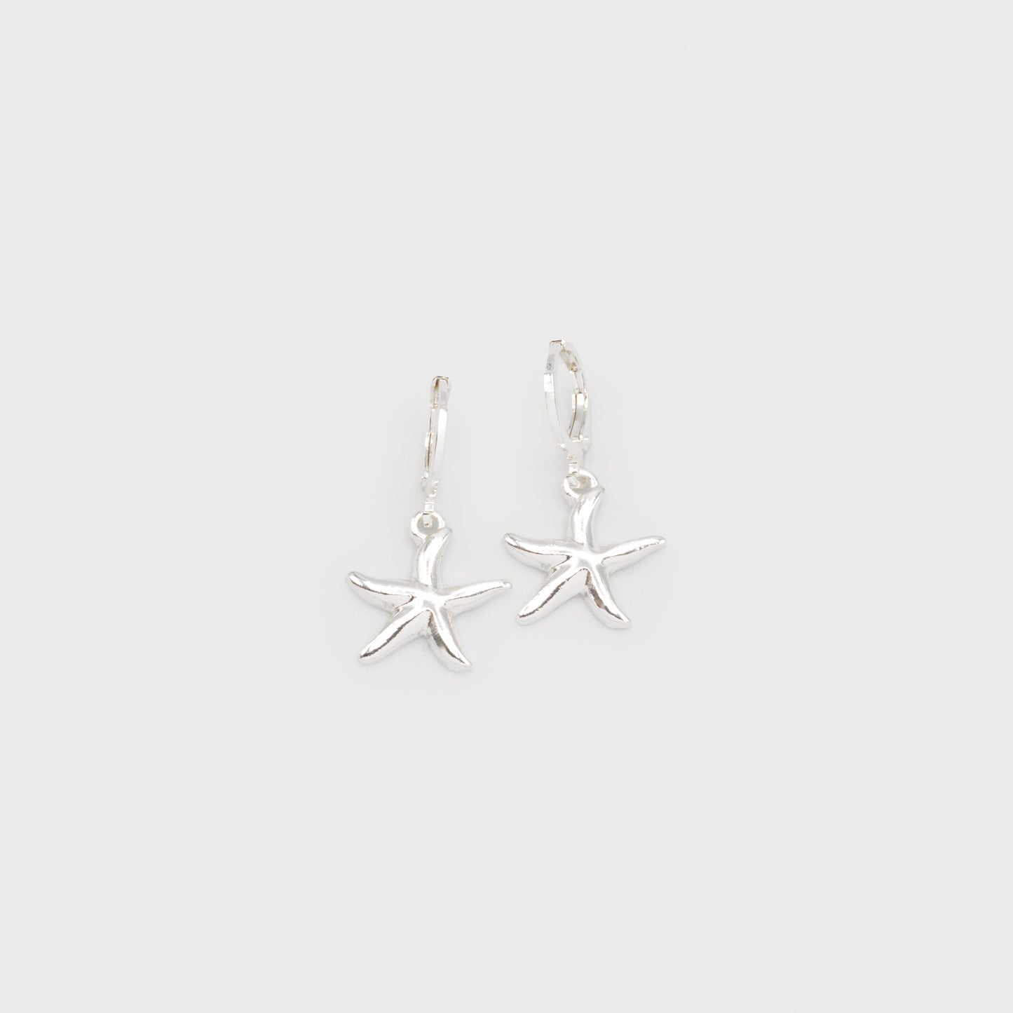 Boucles d'oreilles avec petit pendentif étoile de mer