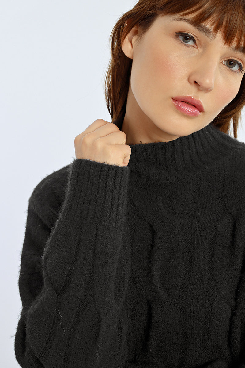 Tricot avec torsades