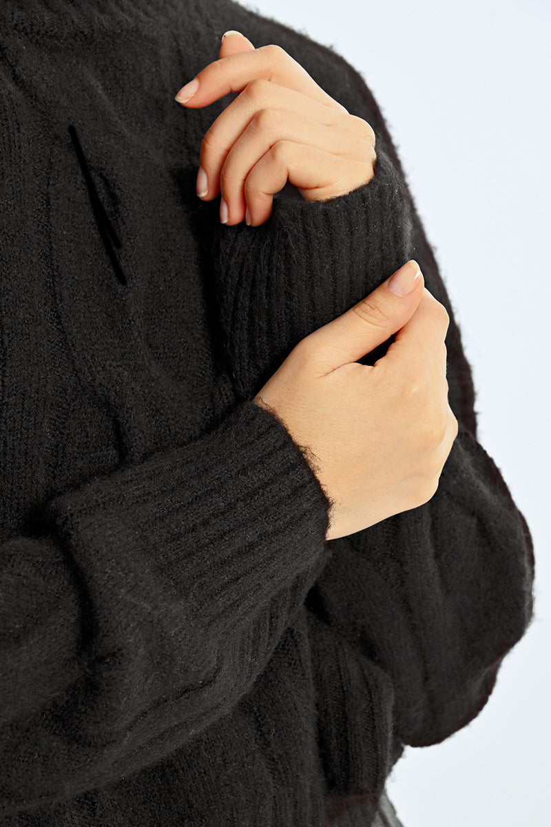 Tricot avec torsades