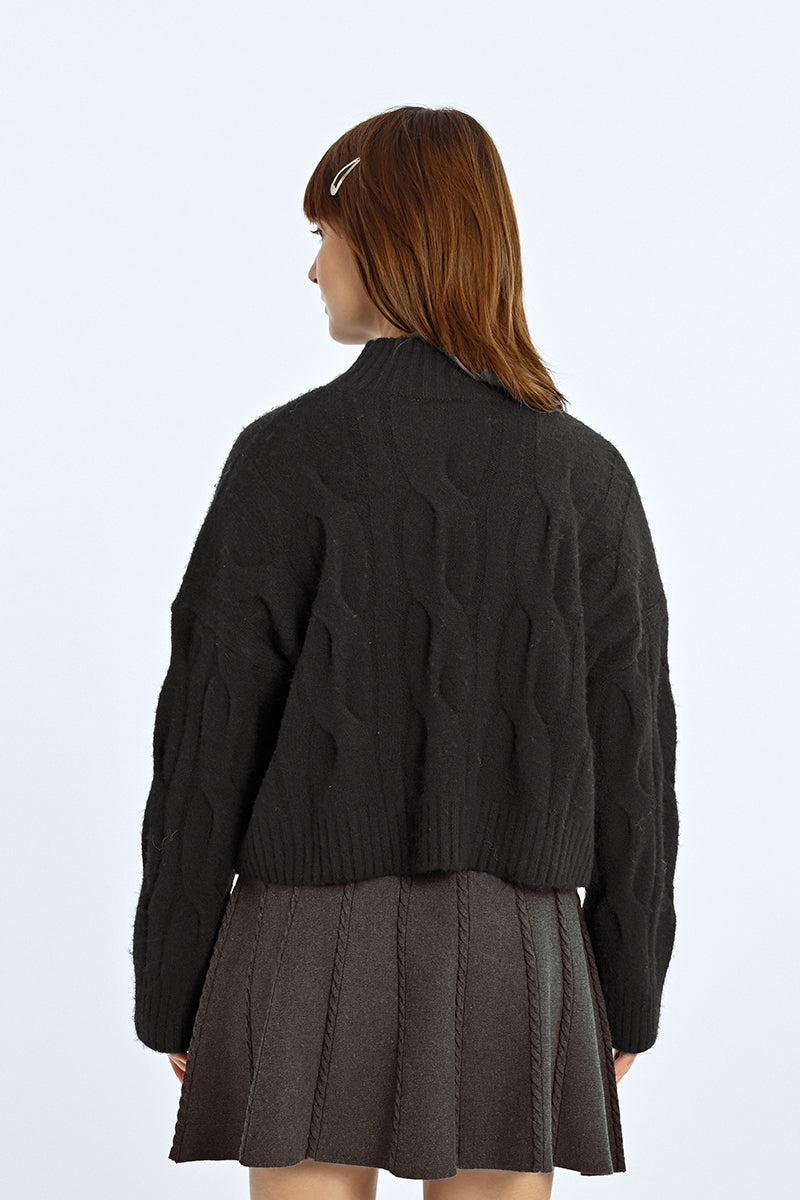 Tricot avec torsades