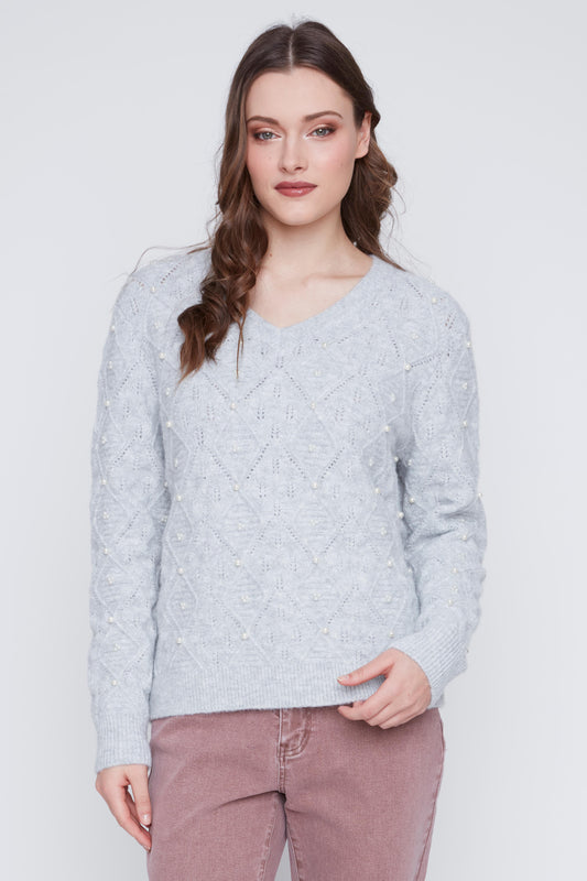 Tricot orné de perles