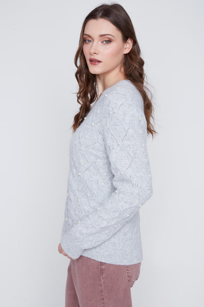 Tricot orné de perles