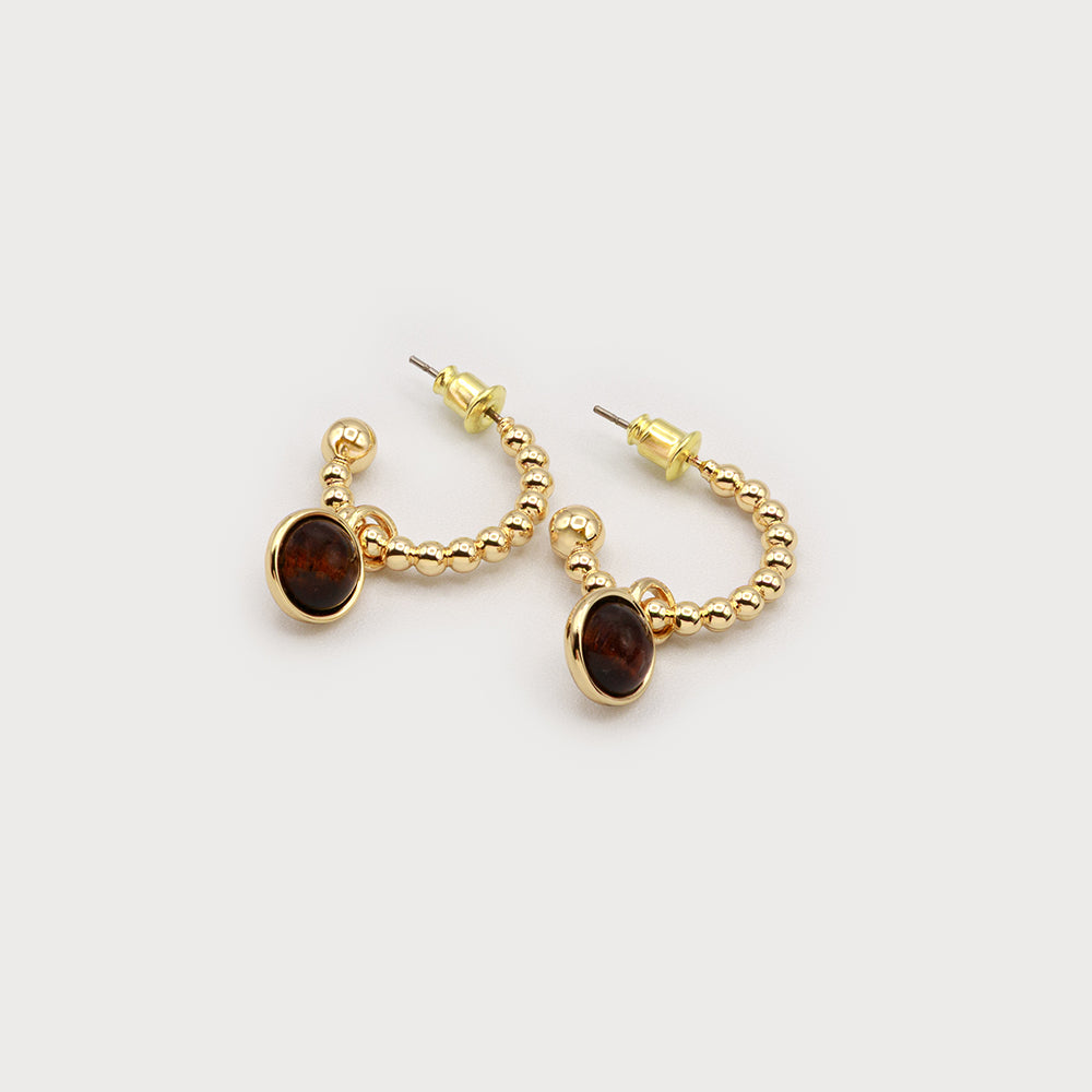 Boucles d'oreilles anneaux texturé petite pierre