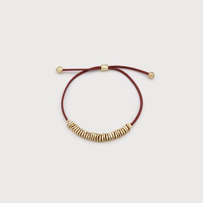 Petit bracelet de cuir ajustable et métal martelé
