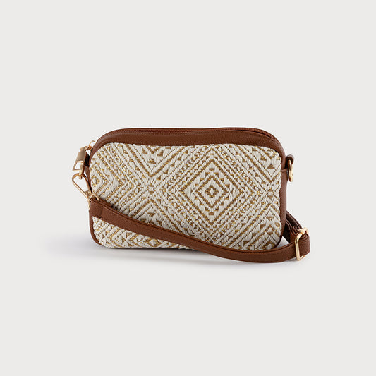 Le mini sac bandoulière en rafia