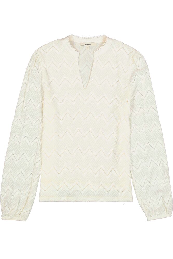 Une blouse lumineuse et raffinée