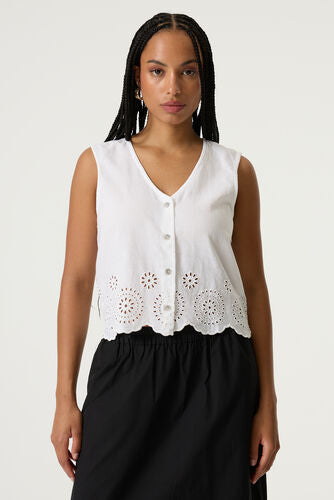Blouse sans manches blanc à broderie anglaise